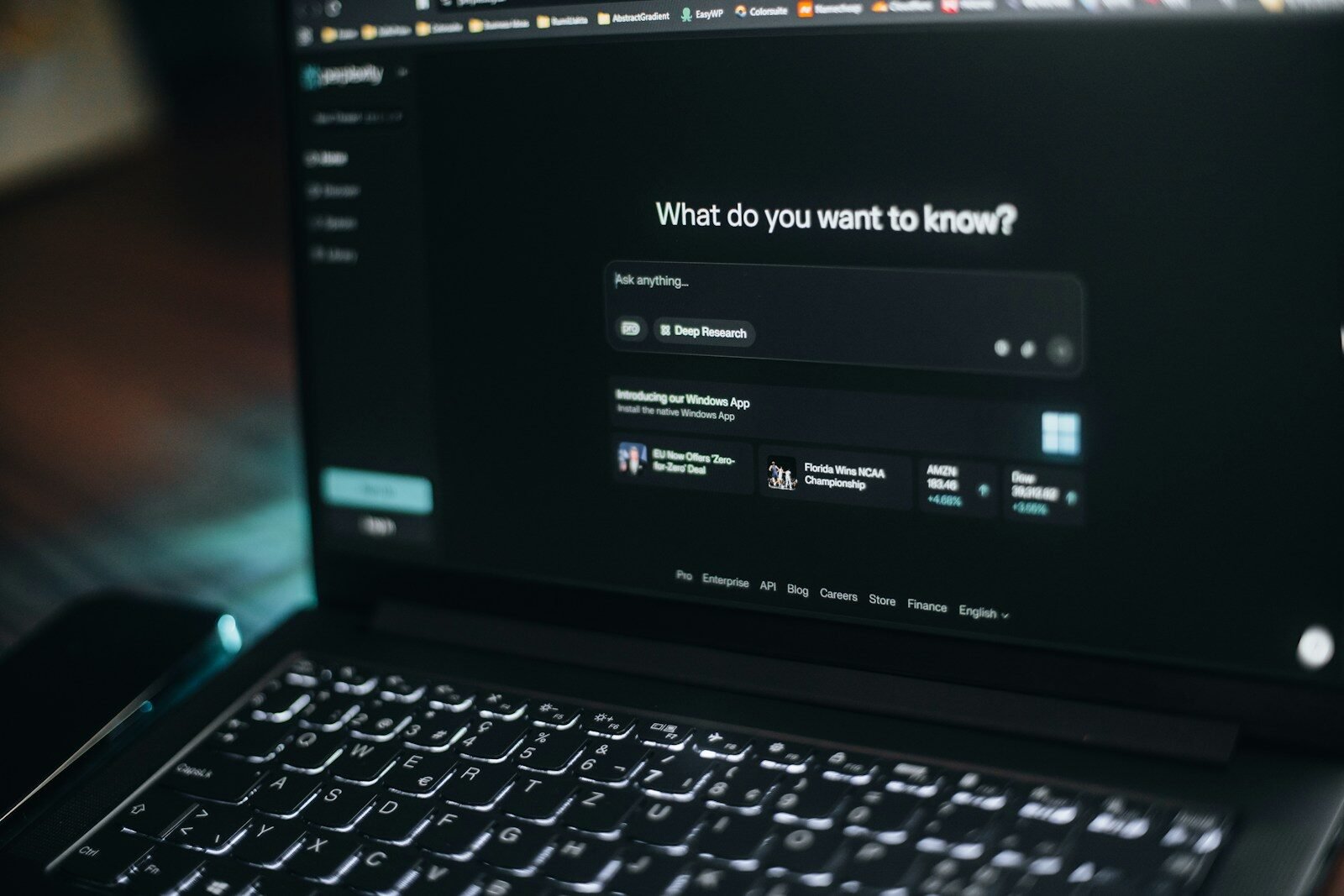Course creator comparing Kajabi alternatives on a laptop